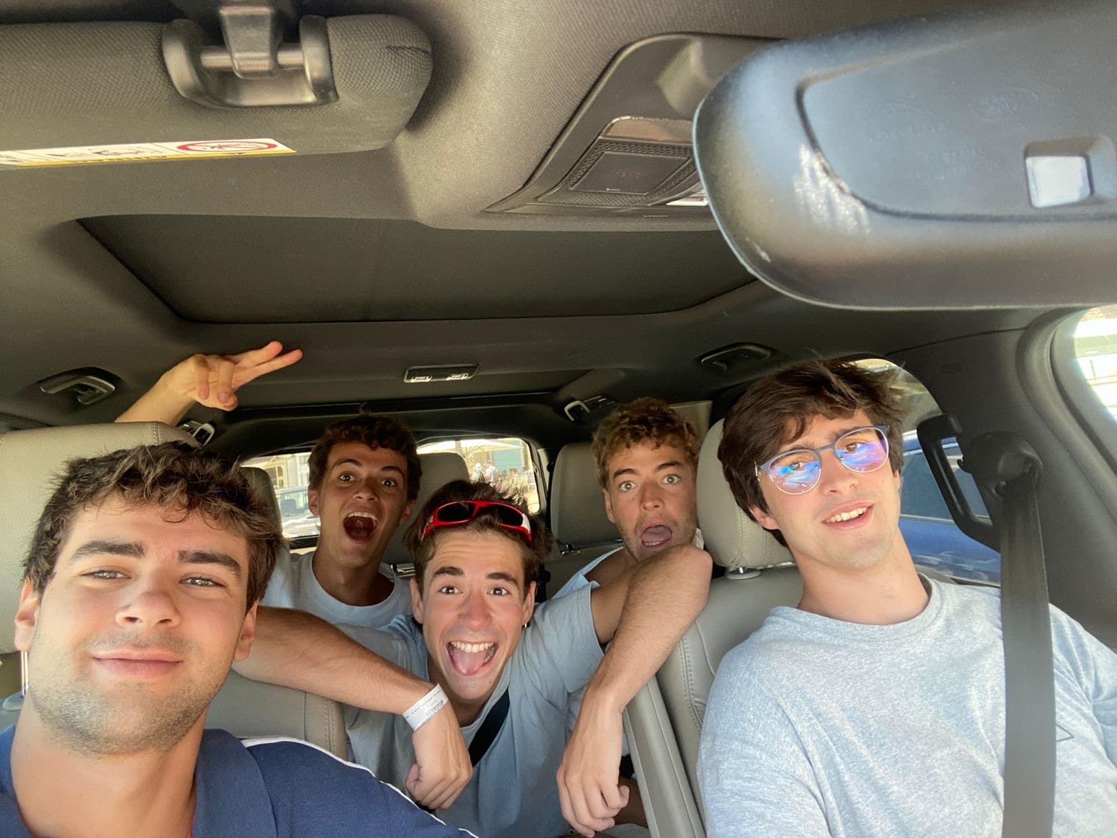 friends in a car, in a photo from the naiss community